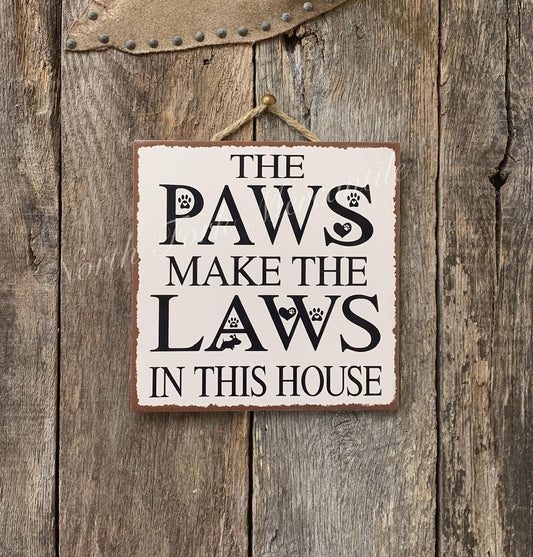 The Paws Make The Laws In This House